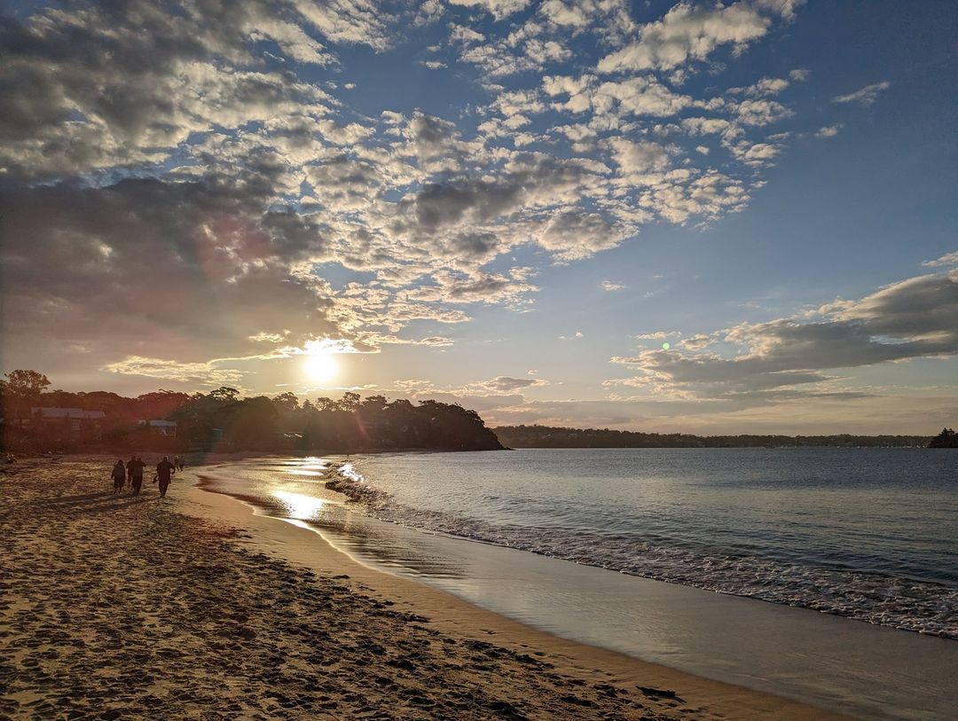 Chris at the beach, walking into the sunset