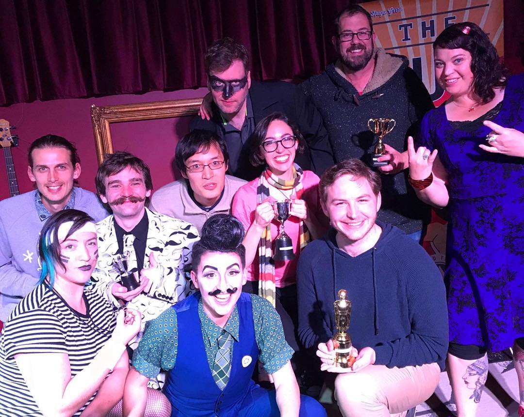 Chris with a group of people in funny costumes