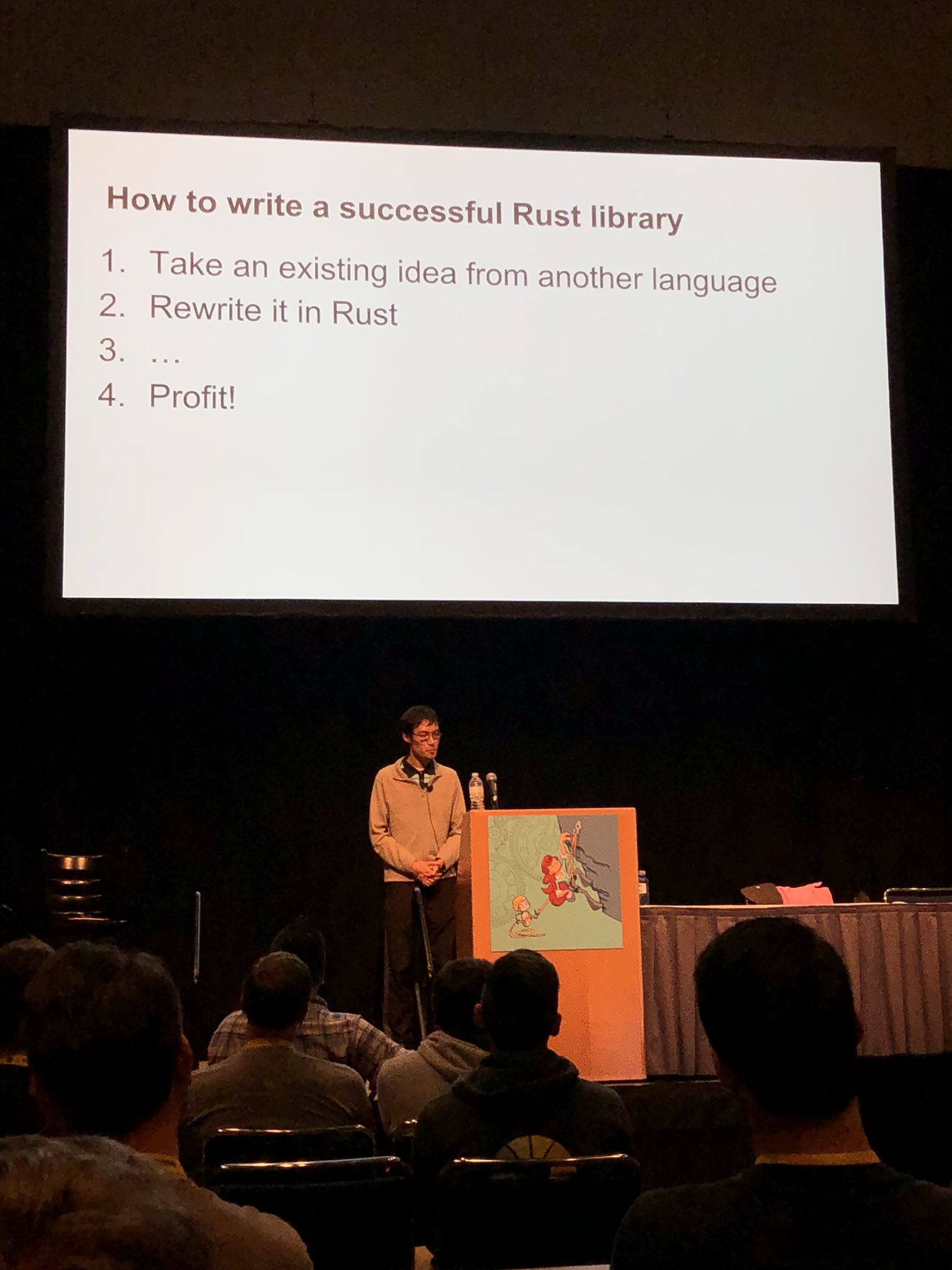 Chris presenting a talk about Rust